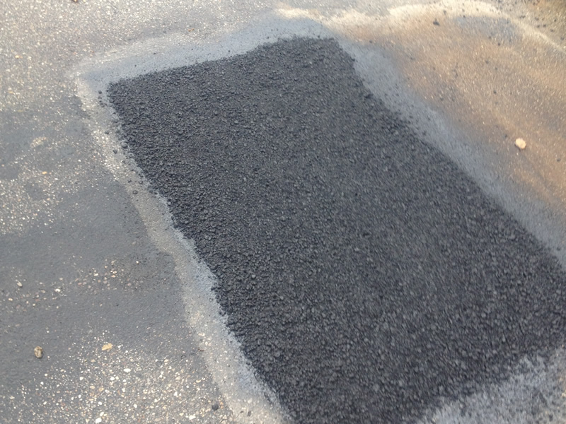 Einbau des Asphalts.